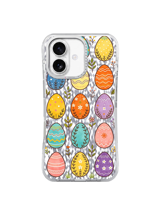 Colorful patterned Easter eggs with spring leaves on a clear iPhone 17 case.