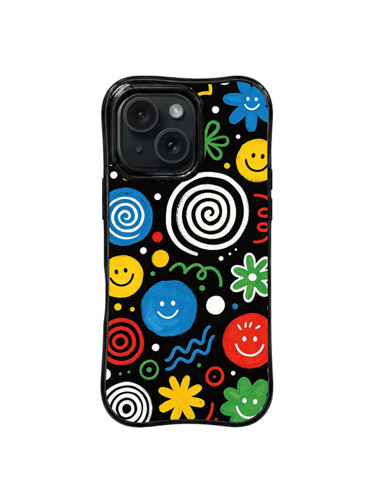 Black iPhone 15 Pro case with colorful smiling circles, spiral targets, flowers, dots, leaves, and squiggles