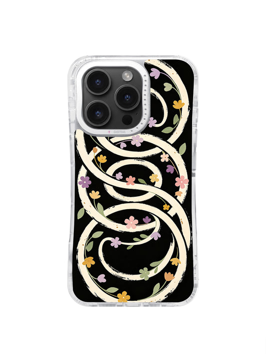 Eternal Bloom Pattern iPhone 16 Pro Max case with cream loops and pastel flowers on black