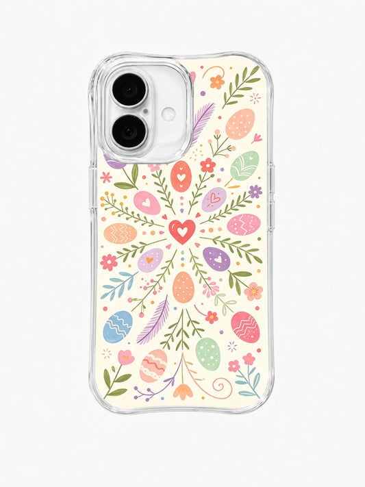 The Little Garden of Wishes: A small coral heart at the center of radiating sprigs, pastel eggs and tiny flowers.