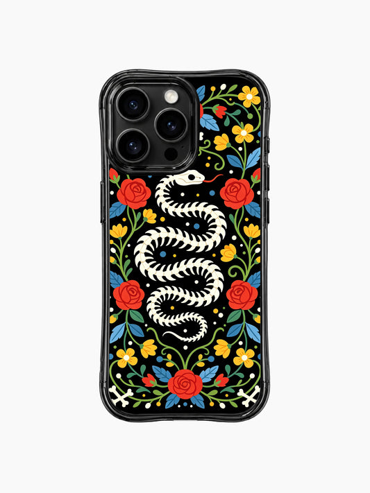 PhoneCasing iPhone 16 pro max Case featuring Estrella Nocturna art: a delicate skeleton snake coiled into a wreath shape, surrounded by vibrant red roses, yellow flowers and blue leaves, whimsical Day of the Dead design for everyday use on iPhone 16 pro max casing.