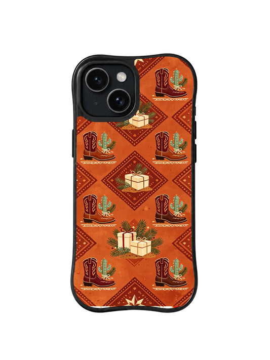 Prairie Christmas iPhone 15 case with cowboy boots, gifts and cacti on terracotta – pattern 1