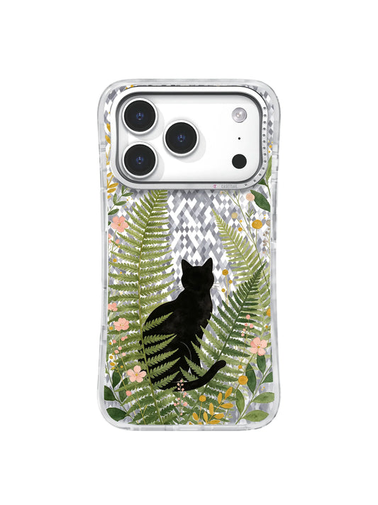 Clear iPhone 17 Pro case with a seated black cat silhouette framed by green ferns, small flowers, and pale gray foliage