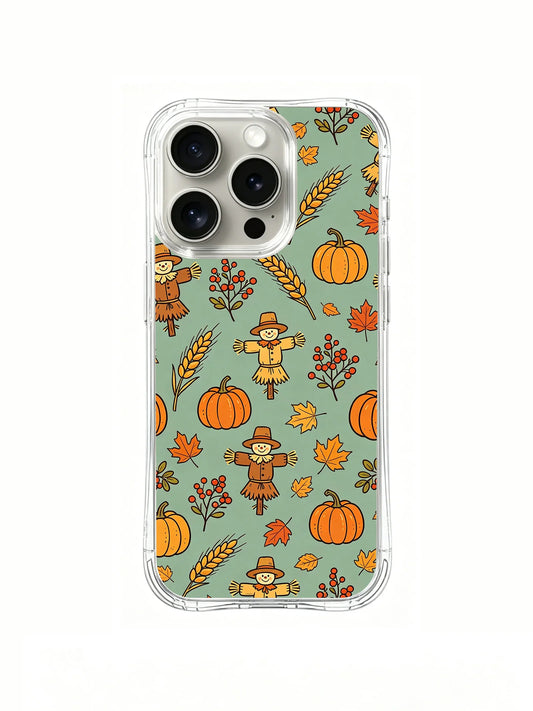 Scarecrows, pumpkins, autumn leaves, and wheat on a sage green iPhone 14 Pro case.