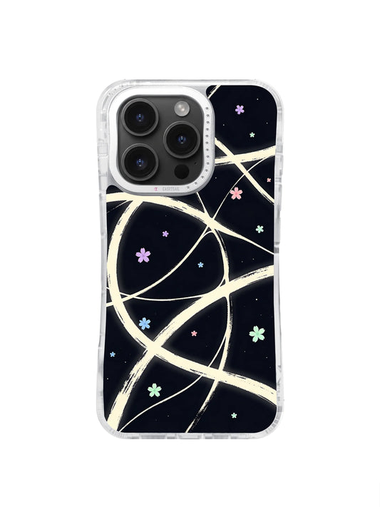 Cream looping lines and tiny colorful flowers on a black iPhone 16 Pro Max case.