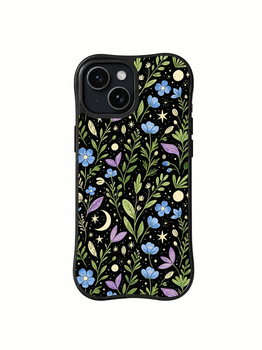 Blue and purple flowers, leafy vines, moons, and stars on a black iPhone 15 Plus case.