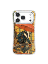 Under a Borrowed Umbrella iPhone 17 Pro case – Rainy Curb Kindness artwork
