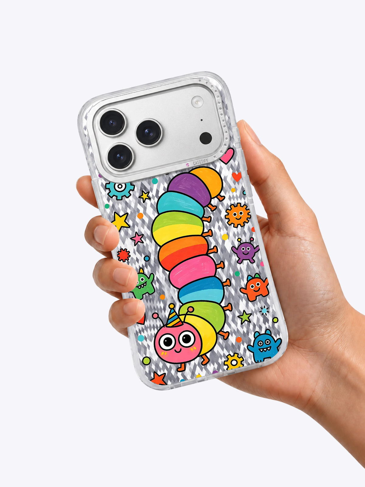 Pembe yüzlü tırtılı alt bölümde görünen Rainbow Caterpillar kılıfını tutan el