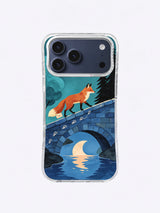 Burnt-coral fox crossing a blue stone bridge above a cobalt river in petrol-teal woods