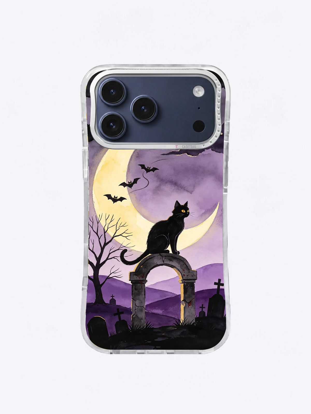 Golden-eyed black cat and crescent moon above lavender cemetery hills on an illustrated iPhone case