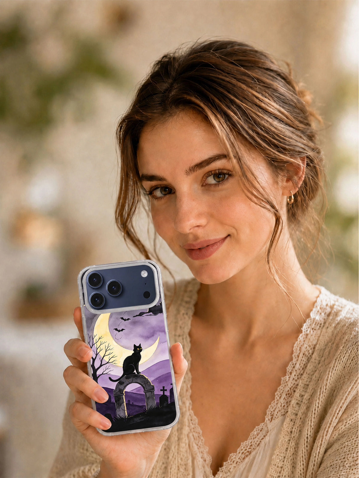 Lifestyle view of the Moonlit Sentinel celestial black cat iPhone case