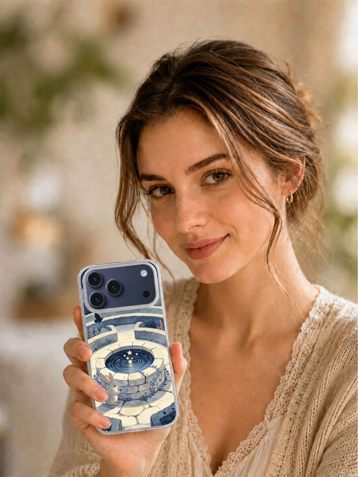 Lifestyle view of The Well of Small Wishes cute celestial iPhone case