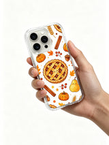 Cozy Thanksgiving Pumpkin Bakery: A hand holds the illustrated case against a light background.