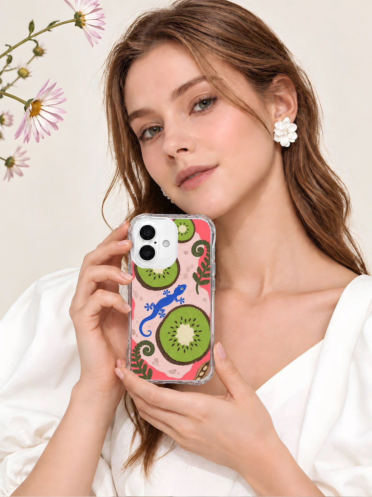 Lifestyle view of A Gecko’s Green Detour coral kiwi iPhone 16 case