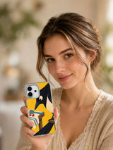 Lifestyle portrait holding the A Spoonful of Sky illustrated iPhone 17 case