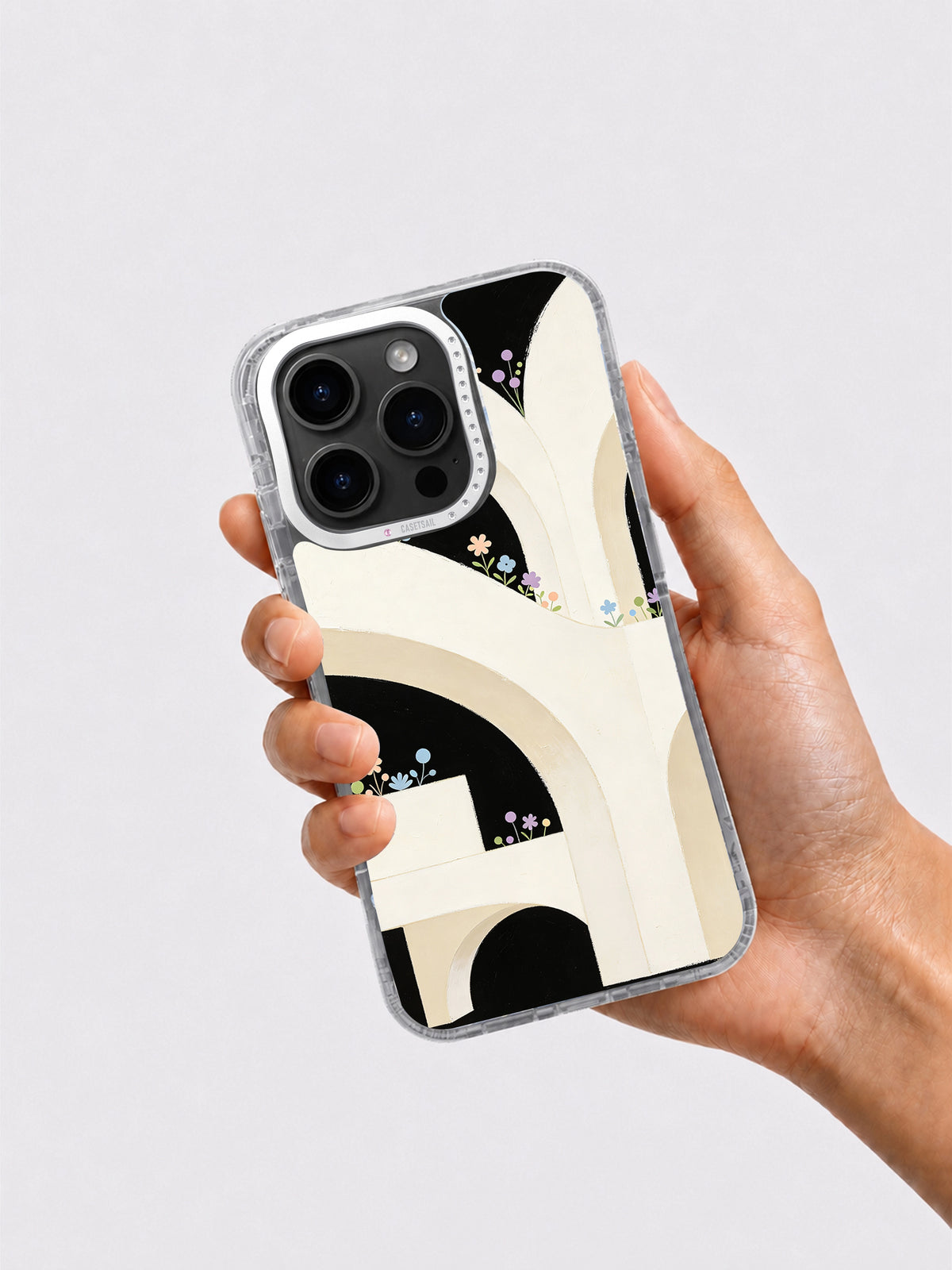 Abstract floral iPhone case held in hand