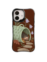 Hedgehog, sideways celadon basket, bellflowers and stepping stones on a dark russet phone case
