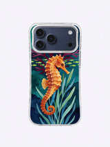 Amber seahorse iPhone case pattern with blue-green sea grass, violet coral, and tiny chartreuse fish