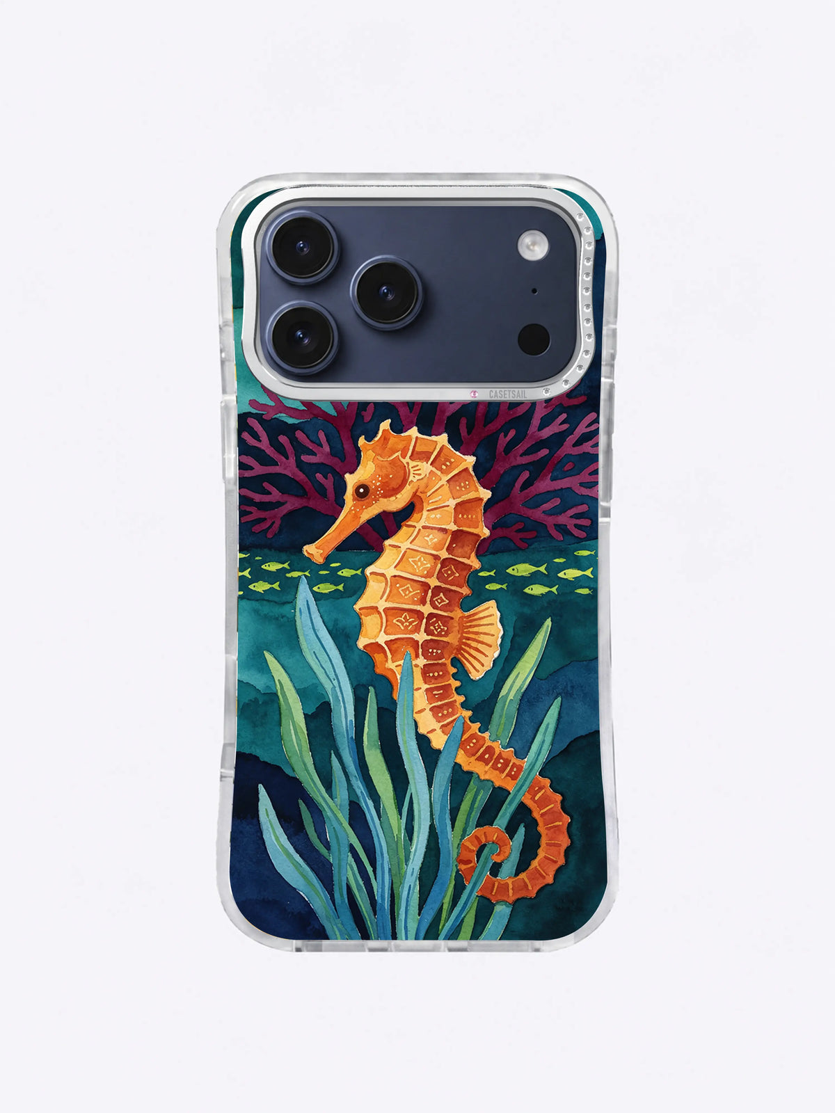 Orange seahorse beside teal sea grass and burgundy coral on a deep ocean background