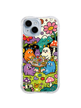 Garden Table Monster Picnic: Colorful monsters sit around a small food table among flowers and mushrooms.