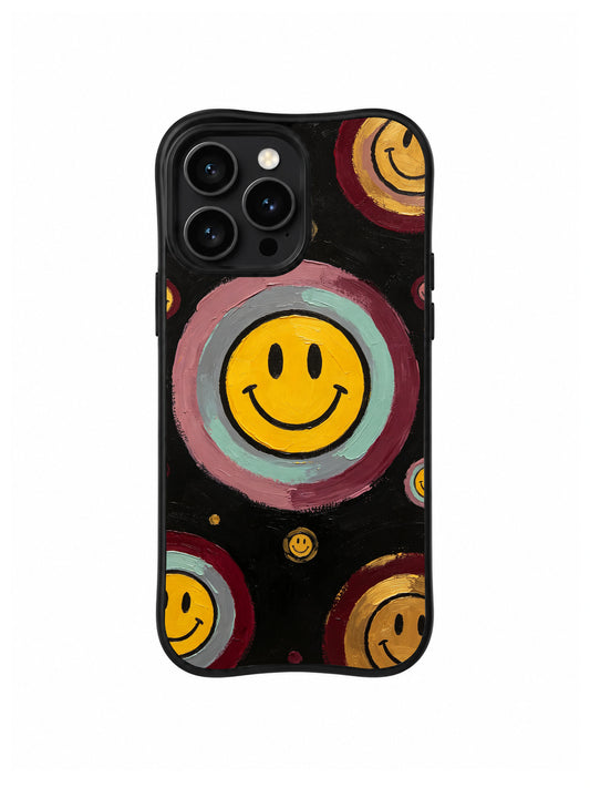 Velvet Insight Halo: A large yellow smile sits inside layered teal, pink and maroon circles on black.