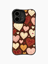 Folk Flourish Hearts: Red, pink, cream and gold ornamental hearts with fine swirls repeat on brown.