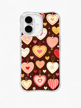 Golden Heart Pendants: Large cream, pink and gold hearts hang among small hearts and fine loops.
