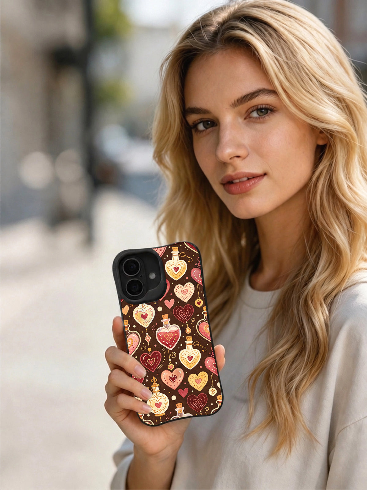 Product or handheld view of the Love Potion Heart Bottles case