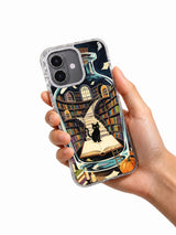 Black Cat Midnight Library iPhone case held in hand