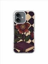 A Flower Between the Pages Copper Bloom Bookmark artwork iPhone 17 Case