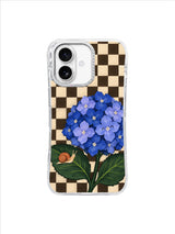 Lavender Floret Path iPhone 17 case artwork with pale lavender and deep blue hydrangea blooms, leafy stems and a small snail.