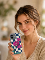Lifestyle view of The Orchid's Small Embrace iPhone 17 case