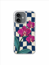 Magenta orchids on navy and pearl checks for an iPhone 17 case