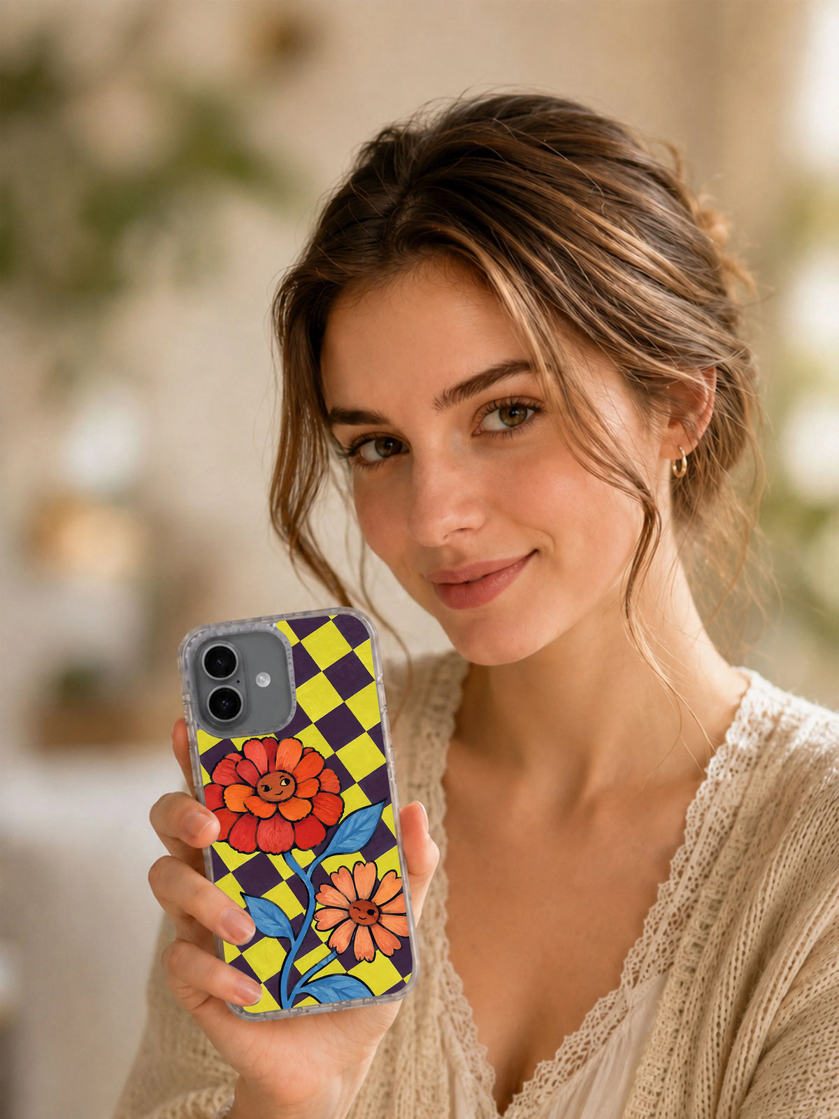 Lifestyle view of the Zinnia Makes Room for Boldness iPhone 17 case
