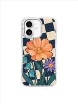 Three distinct garden flowers sharing space over rotated blue-black and warm ivory checks
