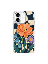 Low floral crown of apricot, turquoise and violet flowers on a navy and ivory checkerboard