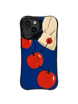 Oversized red apples connected by an S-shaped black thread on blue