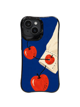 Red apple fastened like a button on a cropped cream sleeve