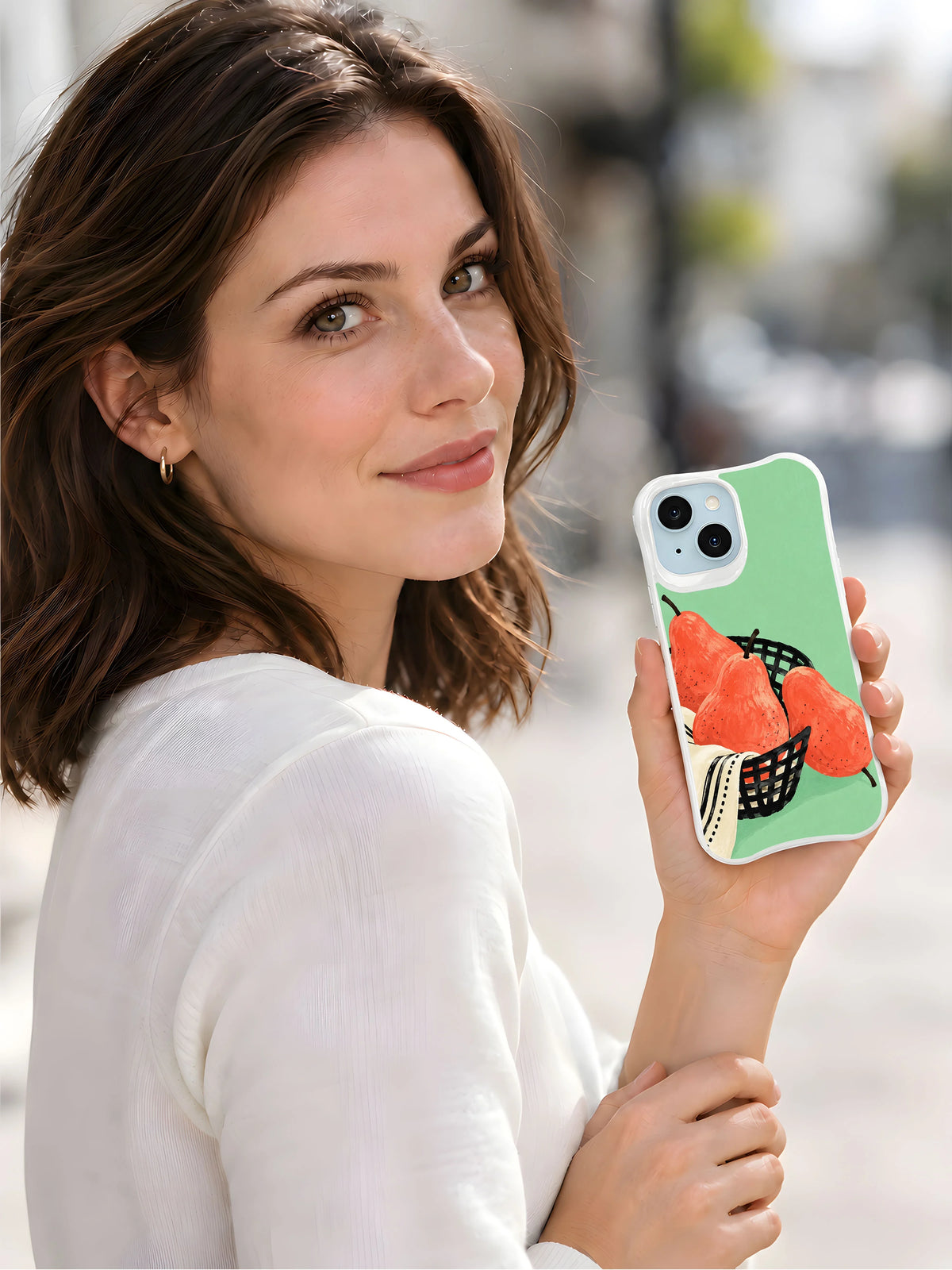 Lifestyle view of The Pear Basket Tilt iPhone 13 case