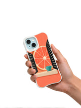 The Grapefruit Window iPhone 13 Case in hand