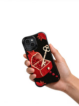 The Pomegranate Key Drawer iPhone 13 Case in hand