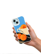 Apricot Teacup Tide white iPhone case held in hand