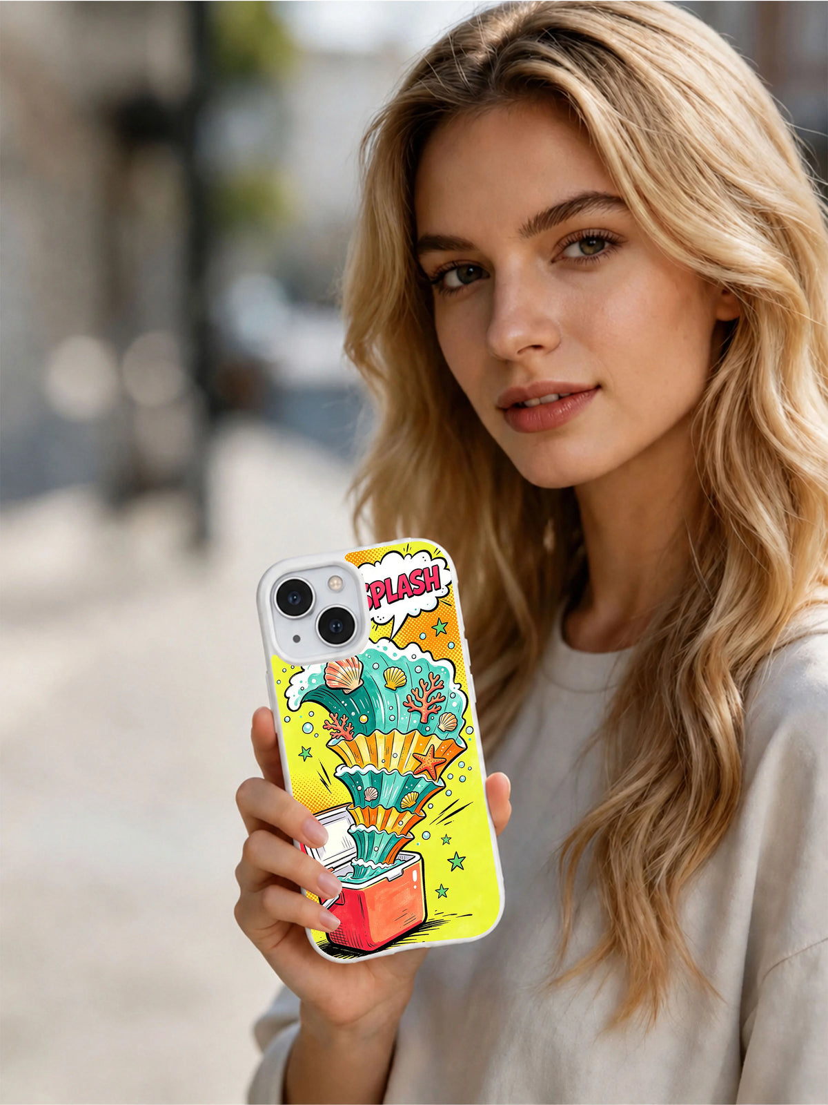 Tidal Cooler Surprise: A person holds the illustrated case in an outdoor portrait.
