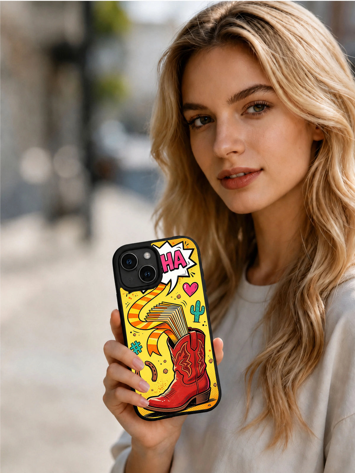 Golden Trail Boot: A person holds the illustrated case in an outdoor portrait.