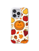 Crimson Apple Harvest / Smiling Harvest Pie: Kırmızı elmalar, armut, üzüm, meşe palamutları ve balkabağı arasında gülümseyen yuvarlak turuncu turta.