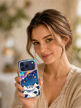 Lifestyle view of the Aurora Kites Over the Village phone case