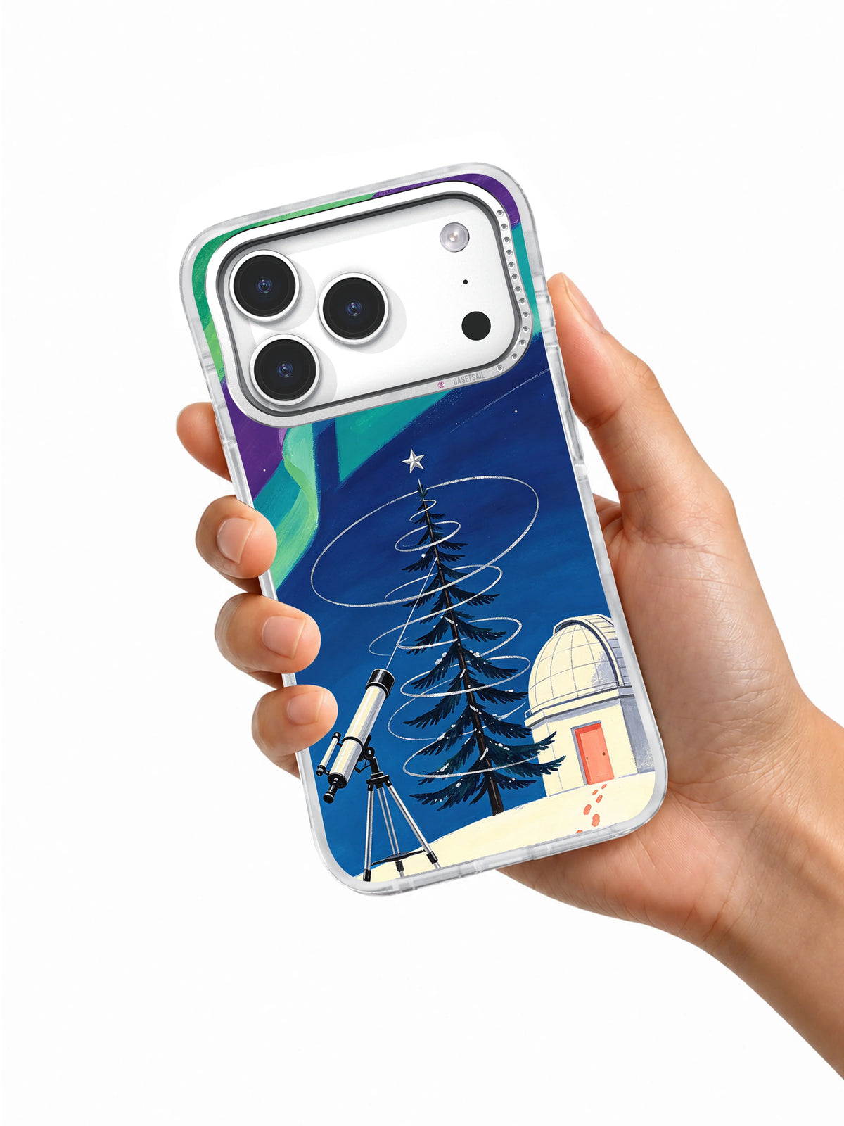 Hand holding Aurora Observatory Tree artwork on an iPhone 17 Pro case
