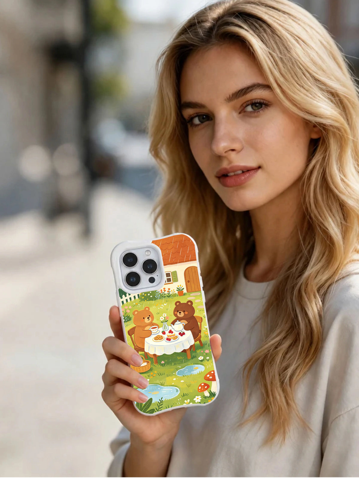 Person holding Bear Tea Afternoon iPhone 14 Pro Max case