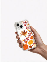 Berry Wren Autumn Thanks: Hand holding the case with its illustrated back facing outward.