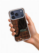 Hand holding The Black Cat’s Paper Crown artwork iPhone 17 Pro case